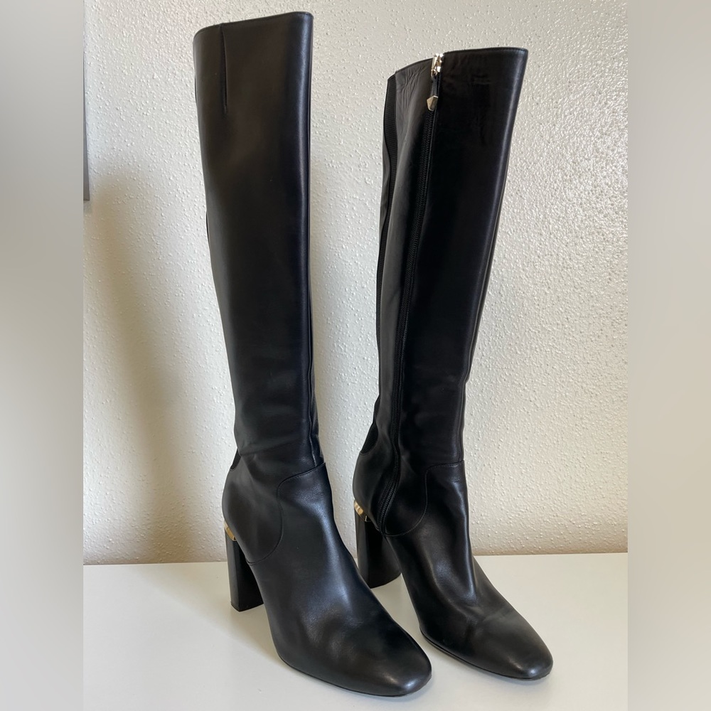 Nicholas Kirkwood black knee high riding boots with gold heel accent